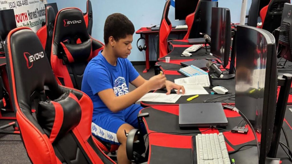 STEM Student sitting at a Computer