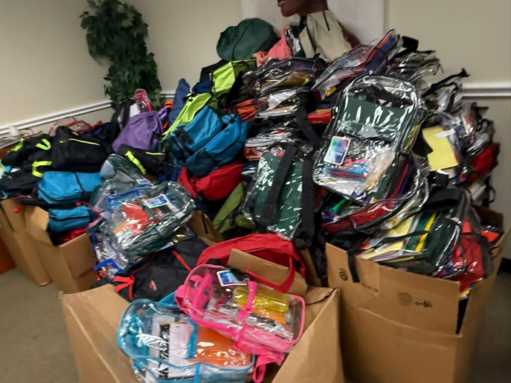 Boxes of Backpacks with school supplies ready for distribution.